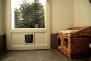 Chatière donnant accès au jardin